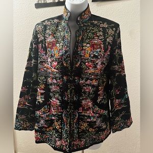 Size 0 lined in black silk. Like new. Fabulous embroidery rich royal colors